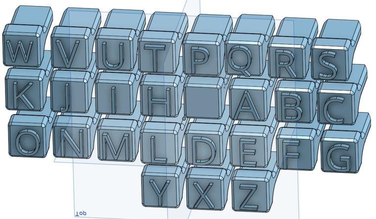 a CAD model of the stamps from above with letters on them now